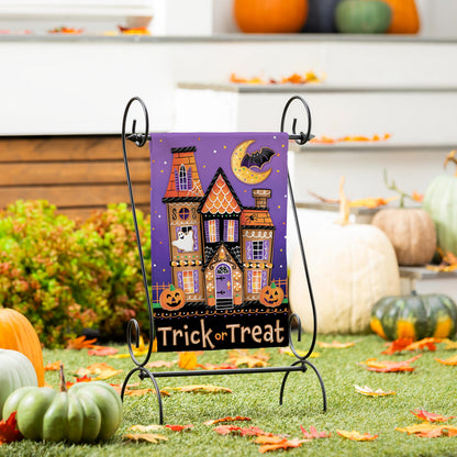 Trick or Sweets Lustre Garden Flag purple Halloween houses moon design on metal stand on Tampa Home & Garden Store