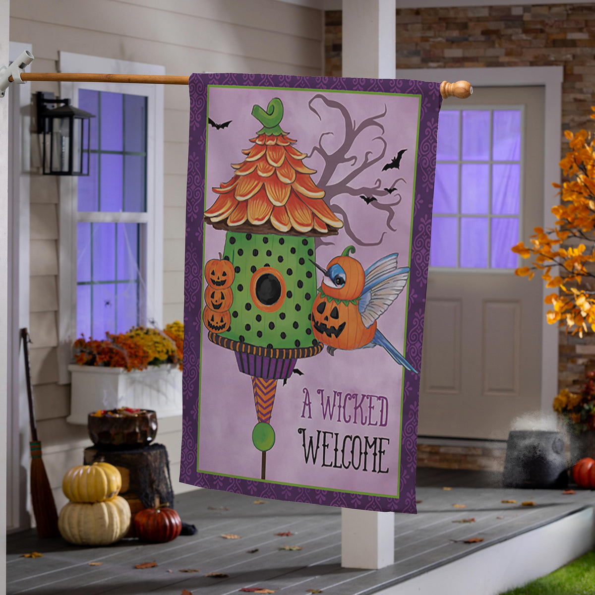 Trick or Tweet Suede House Flag with purple border Halloween pumpkins bats artwork on porch rod on Tampa Home & Garden Store