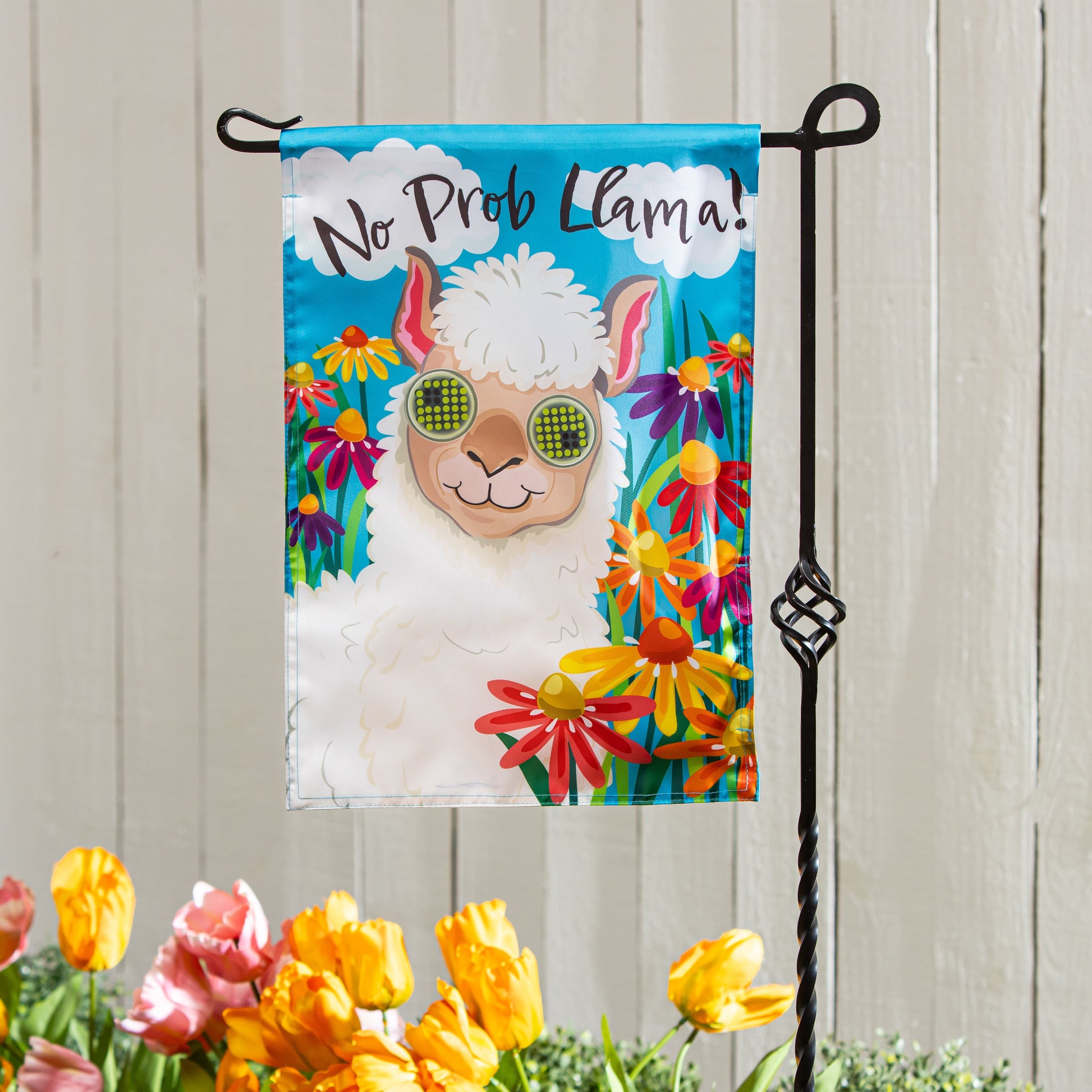 Animated No Prob Llama applique lighted garden flag with blue background and flowers on Tampa Home & Garden Store