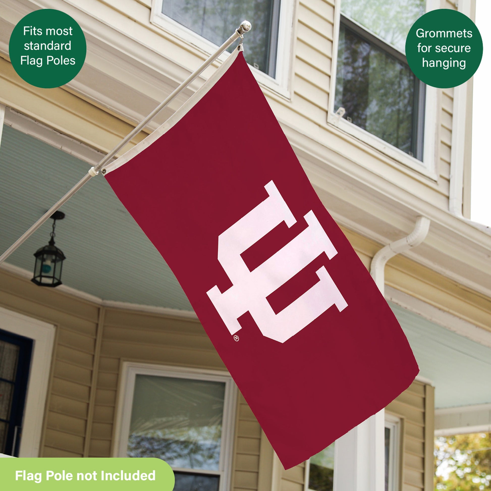3x5 ft Indiana University flag w/ 2 grommets on metal flagpole with ball finial in front of house on Tampa Home & Garden Store
