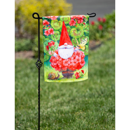 Geranium Gnome Garden Suede Flag with red hat amid pink geraniums and green leaves on Tampa Home & Garden Store