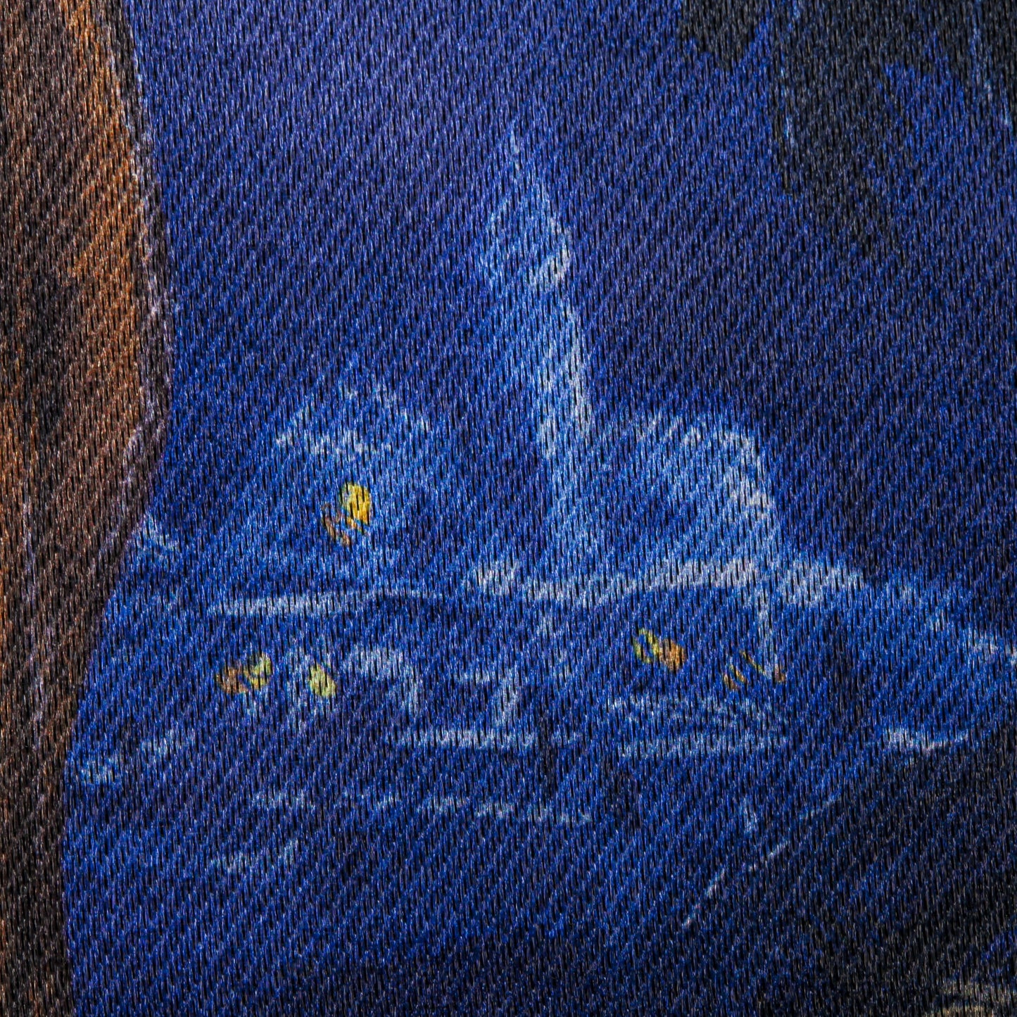 Holy Night Nativity Garden Lustre Flag close-up on blue denim fabric with brown edge on Tampa Home & Garden Store