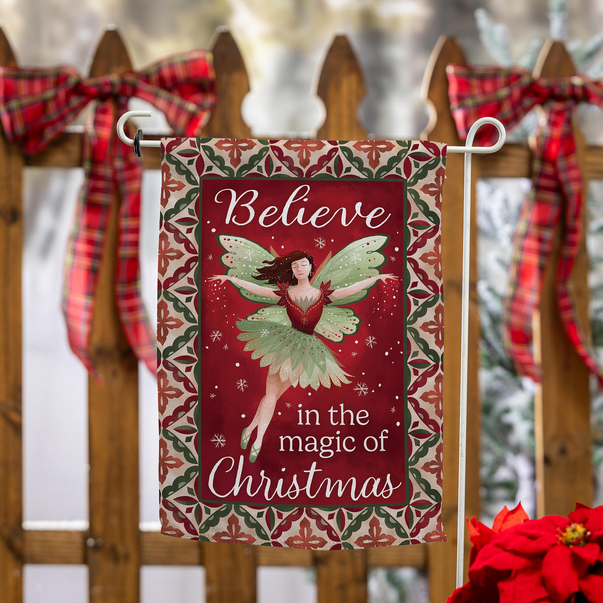 Believe Fairy Suede Garden Flag by Evergreen Enterprises on white metal stand with red border on Tampa Home & Garden Store