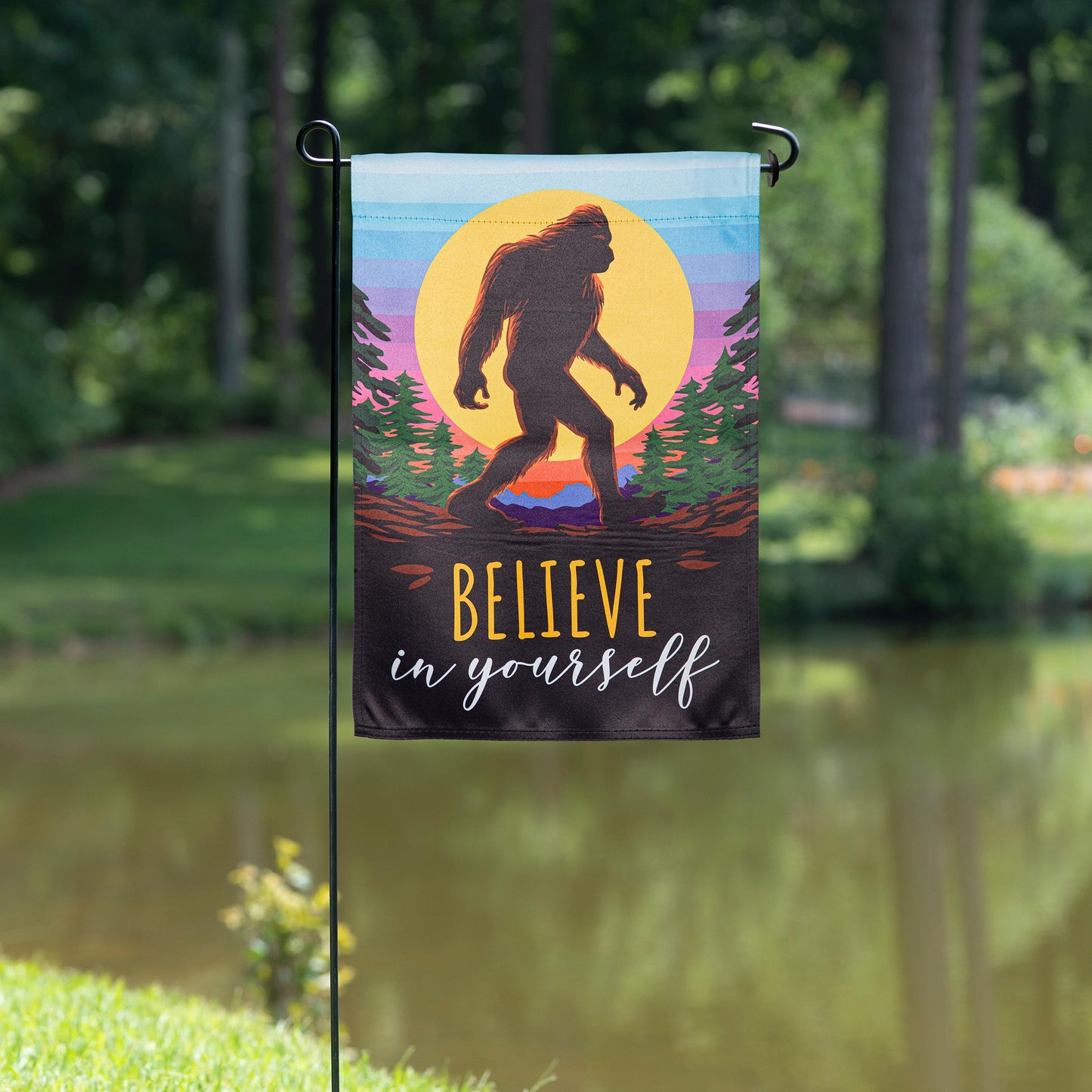 Big Foot Believe In Yourself suede garden flag with silhouetted Bigfoot and sunset stripes on Tampa Home & Garden Store