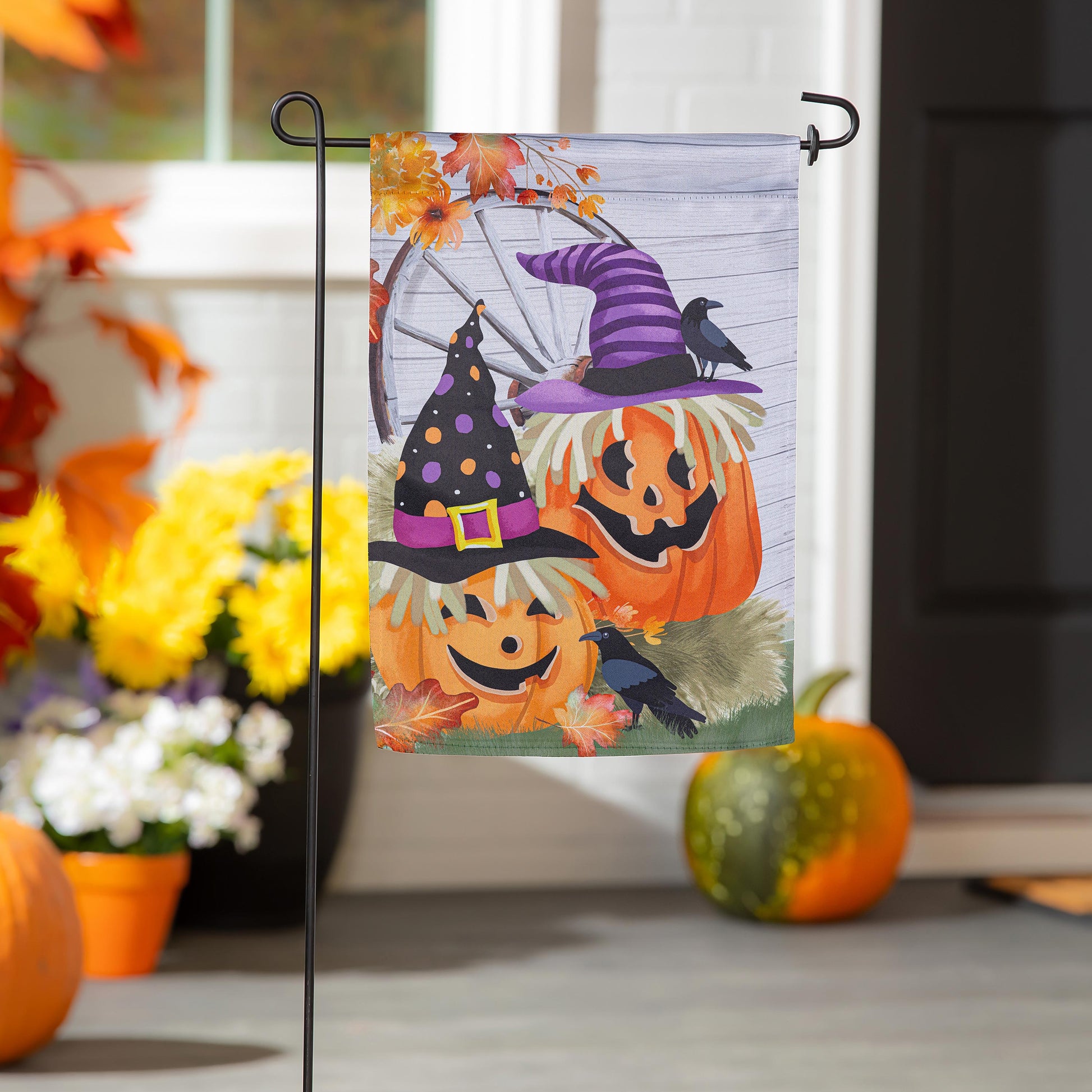 Couple Of Jacks Pumpkin Suede Garden Flag with pumpkins, witch hat and crow on autumn wood on Tampa Home & Garden Store