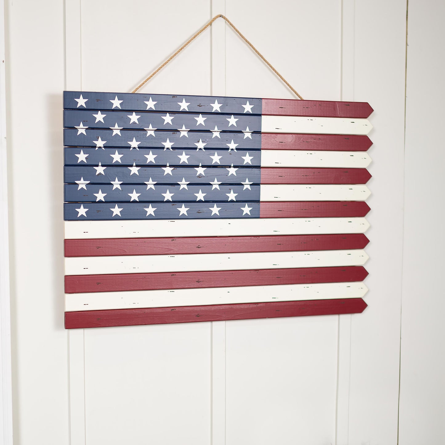 Classic American Flag wooden wall art with starry blue field and red/white planks, rope-hung on Tampa Home & Garden Store