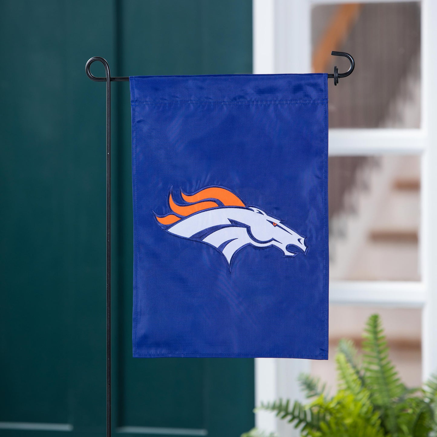 Applique Flag Denver Broncos garden flag on blue with orange bronco logo on metal stand on Tampa Home & Garden Store