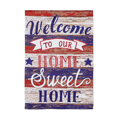 Farmhouse suede flag with rustic red white blue Welcome text and distressed wood backdrop on Tampa Home & Garden Store