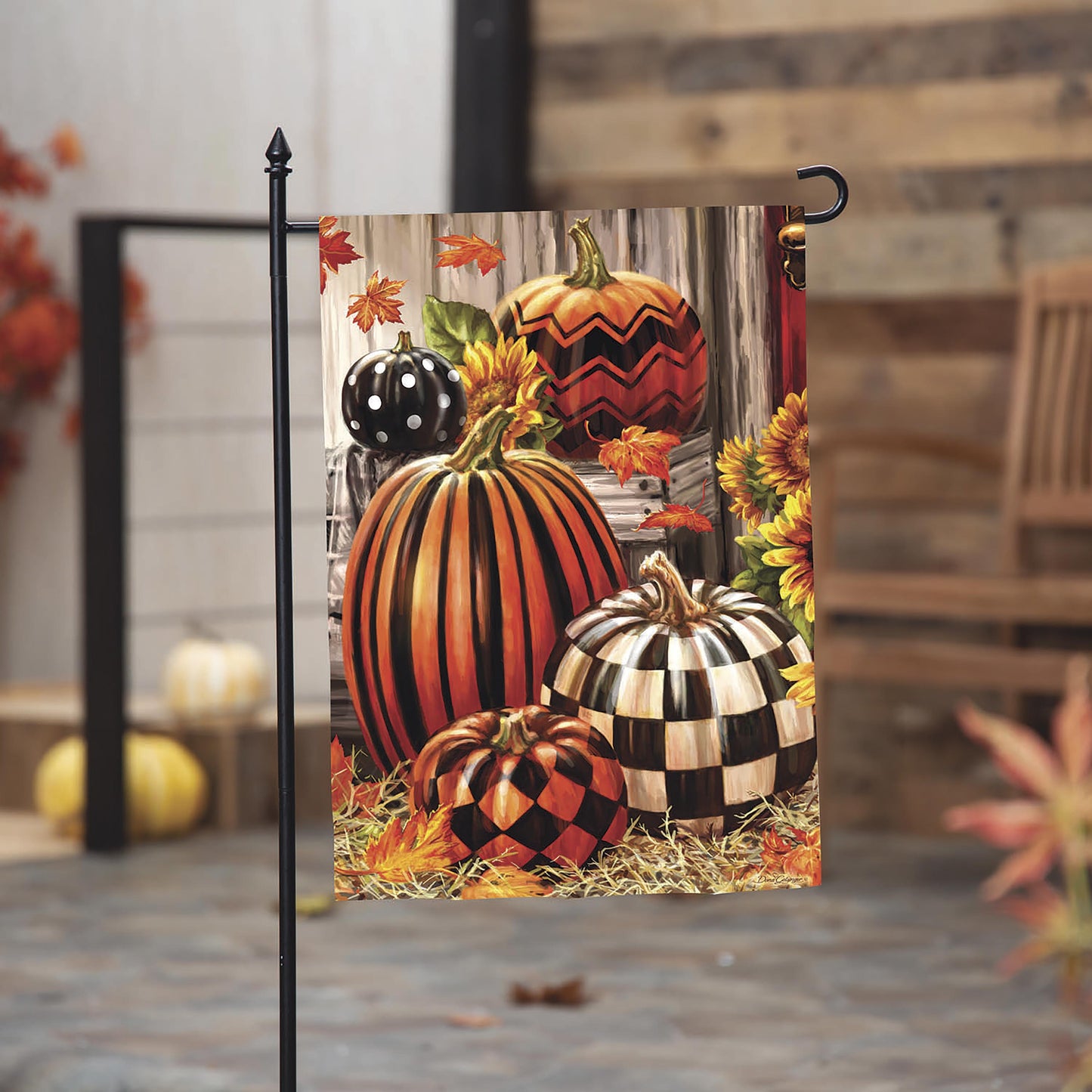 Fall Harvest Pumpkins Burlap Garden Flag featuring pumpkins and autumn leaves on a metal stand on Tampa Home & Garden Store