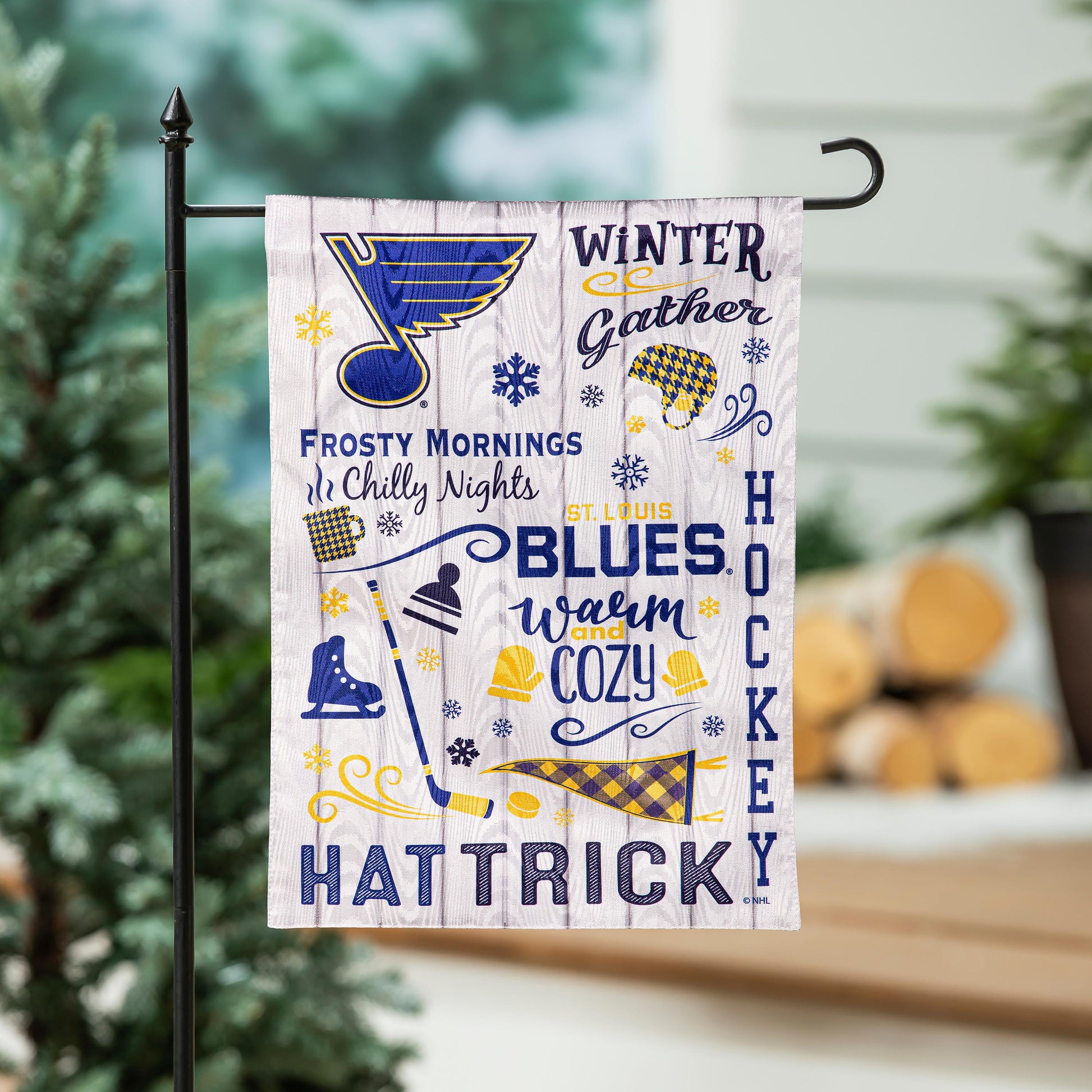 Moire Flag St. Louis Blues on cream background with blue logo and winter motifs on Tampa Home & Garden Store