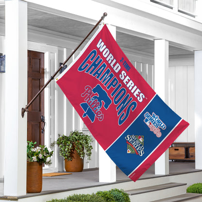 Philadelphia Phillies 3x5 single-sided flag with 2 grommets on a flagpole, displayed on a porch on Tampa Home & Garden Store