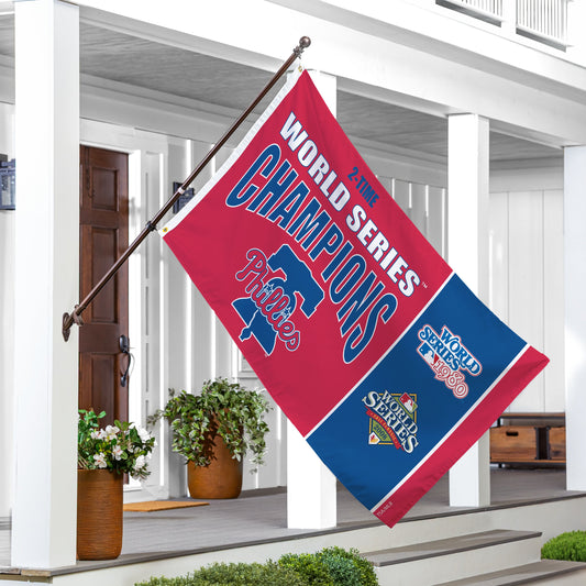 Philadelphia Phillies 3x5 single-sided flag with 2 grommets on a flagpole, displayed on a porch on Tampa Home & Garden Store