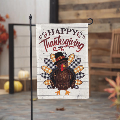 Pilgrim Turkey Burlap Flag with Happy Thanksgiving text on whitewashed wood backdrop on Tampa Home & Garden Store