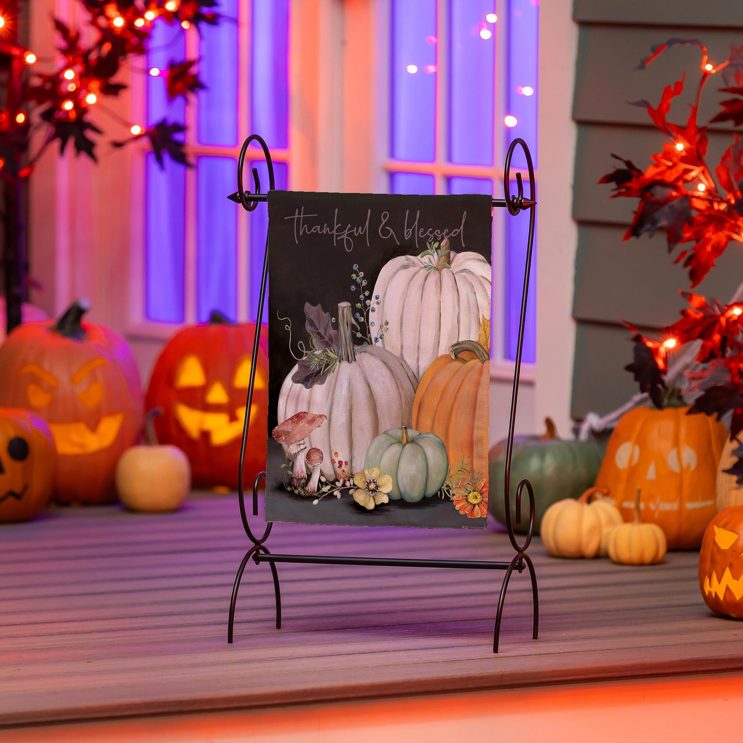 Beauty Of Fall Suede Garden Flag with pumpkin motif and autumn florals on a metal stand on Tampa Home & Garden Store