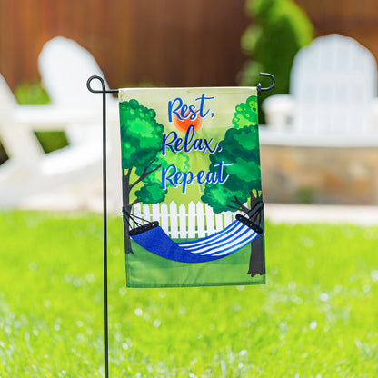 3-Piece Garden Flag Stand black metal frame holds a flag with trees and white picket fence on Tampa Home & Garden Store