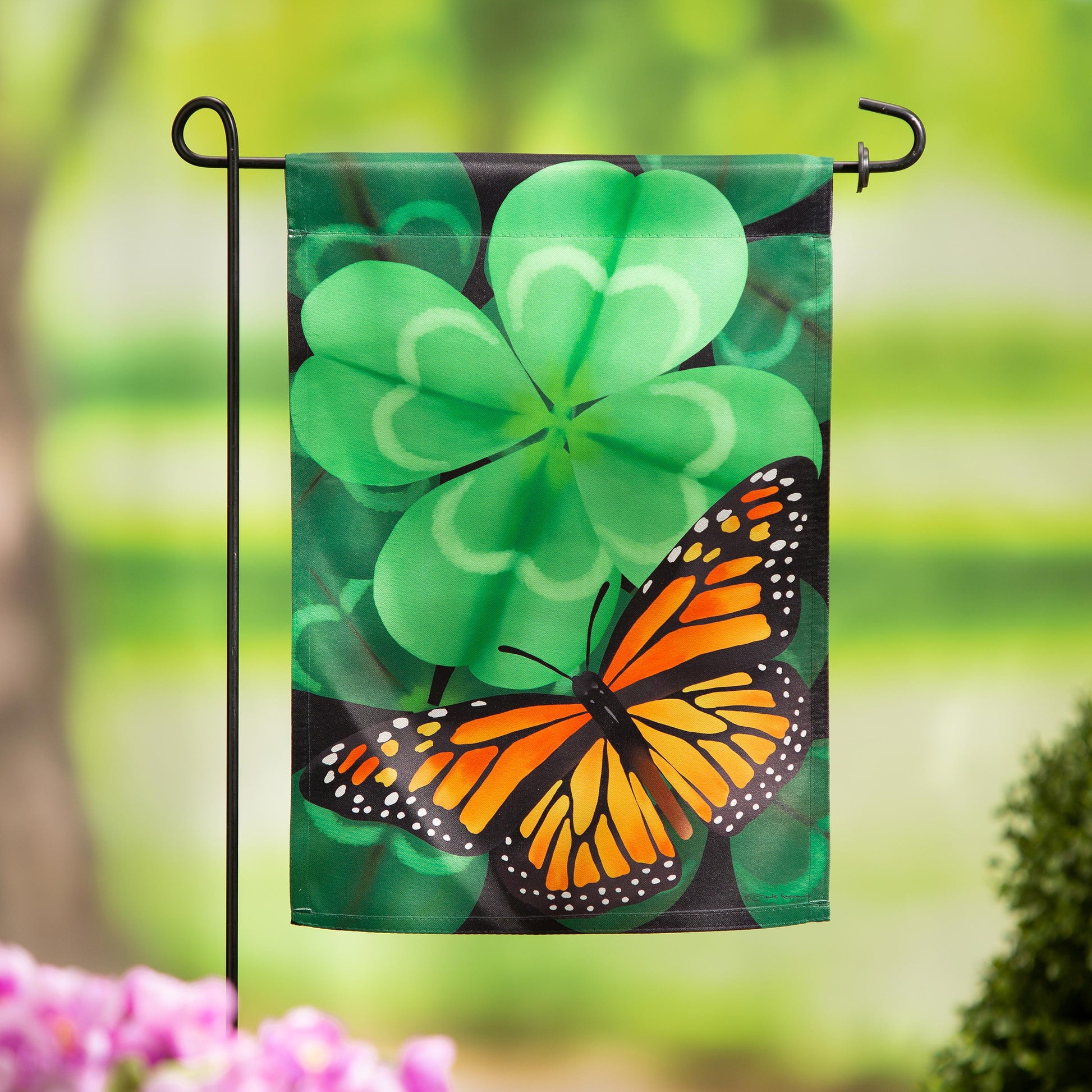 Butterfly Clover Suede Garden Flag green with large clover pattern and orange butterfly design on Tampa Home & Garden Store