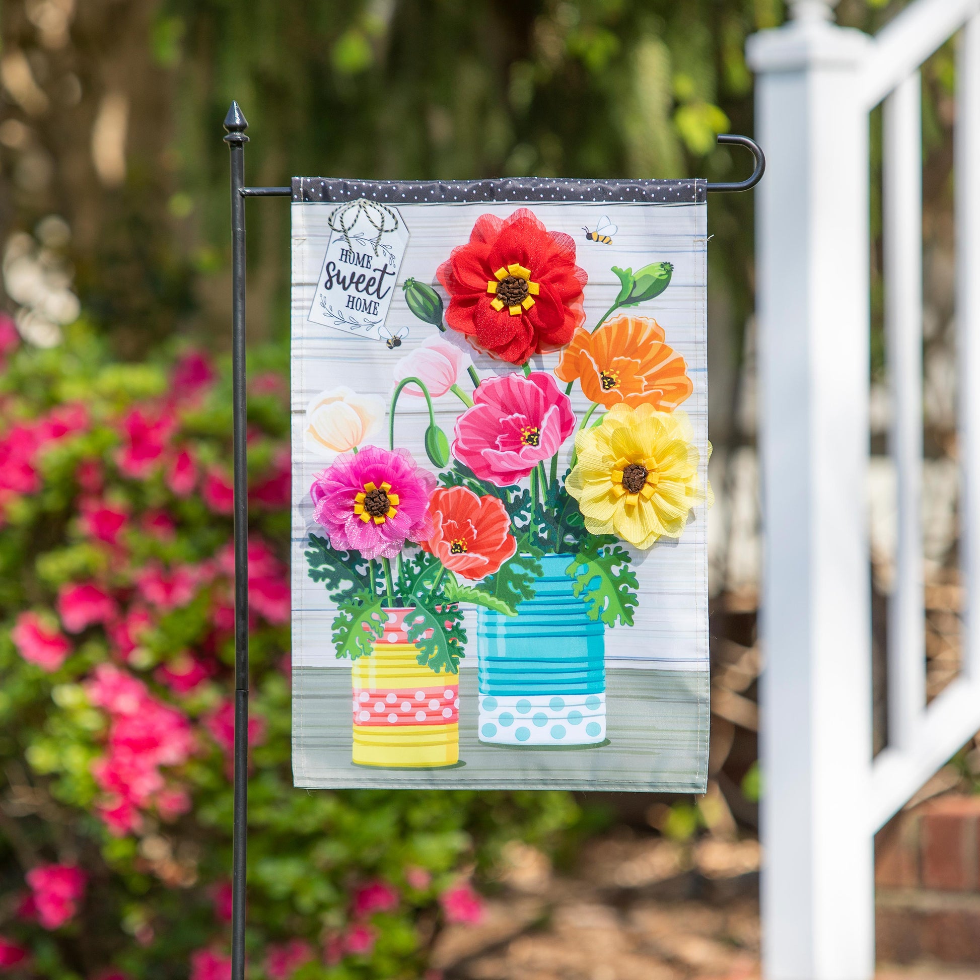 Applique garden flag shows bright poppies in a blue vase with painted cans, 3D red flower accent on Tampa Home & Garden Store