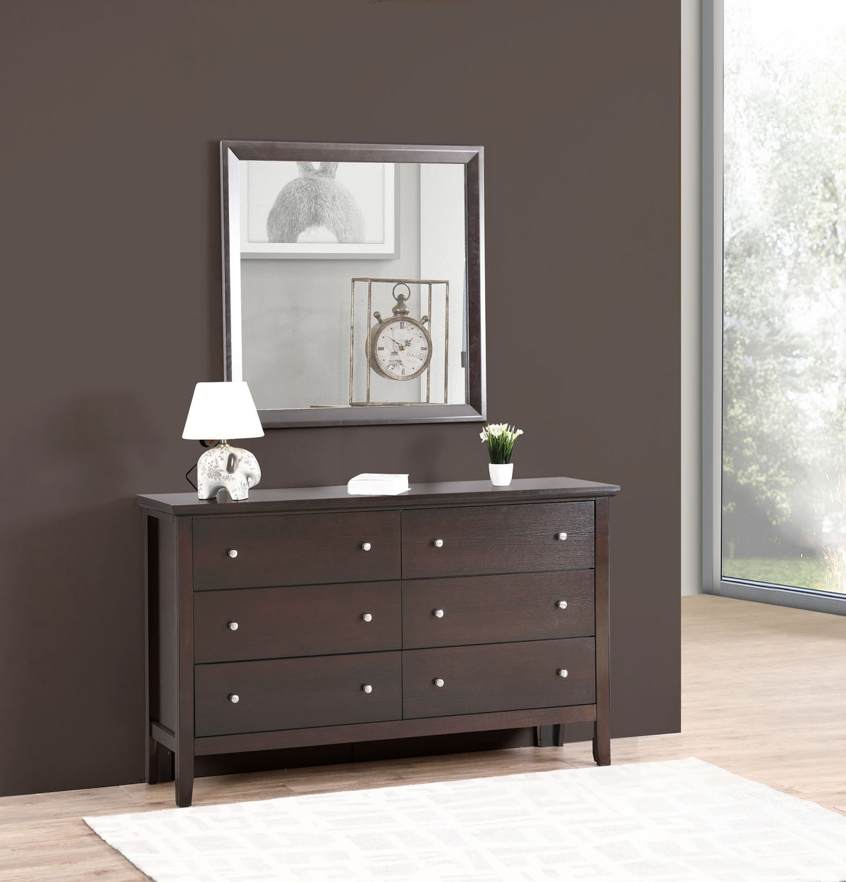Primo Square Wall Mirror with silver metal frame above dark wood dresser on taupe wall on Tampa Home & Garden Store