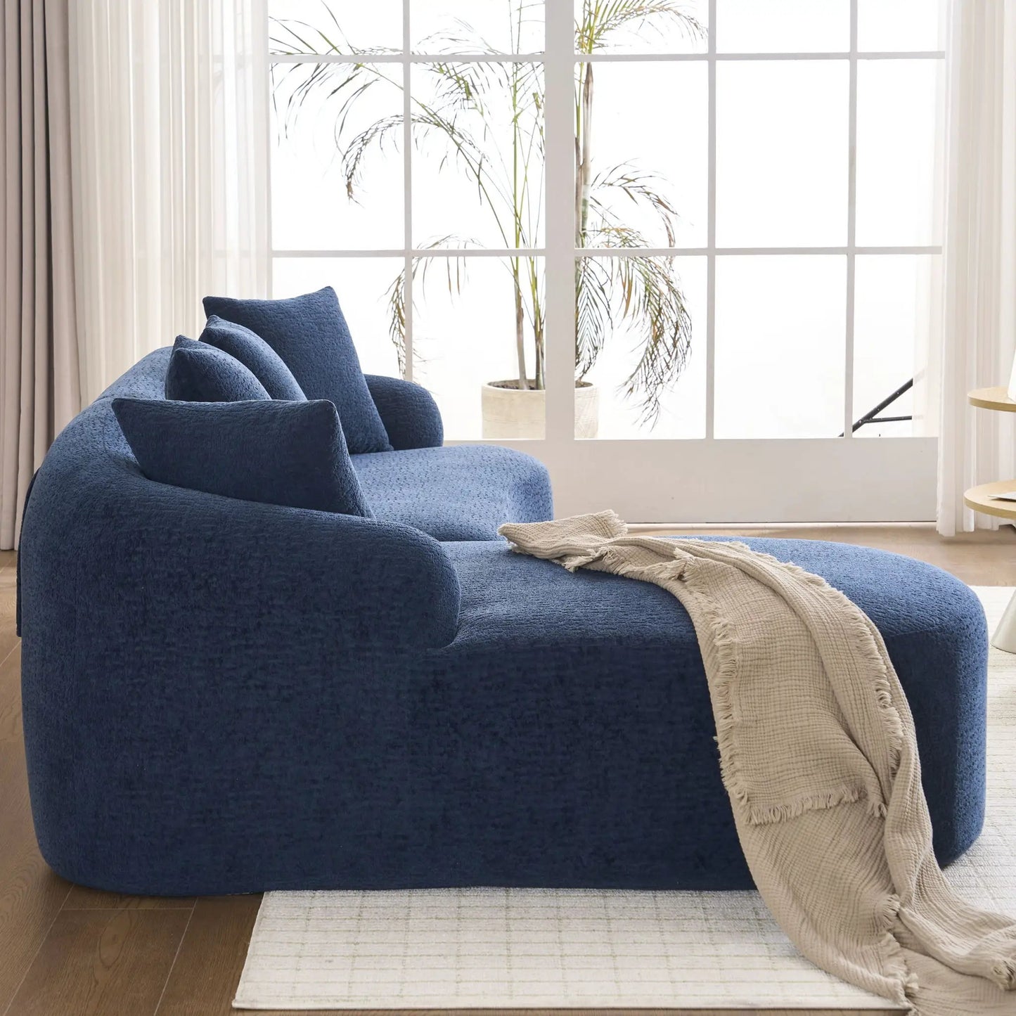 Combined Sofa With 4 Pillows, blue upholstered seating with a beige knit throw on Tampa Home & Garden Store