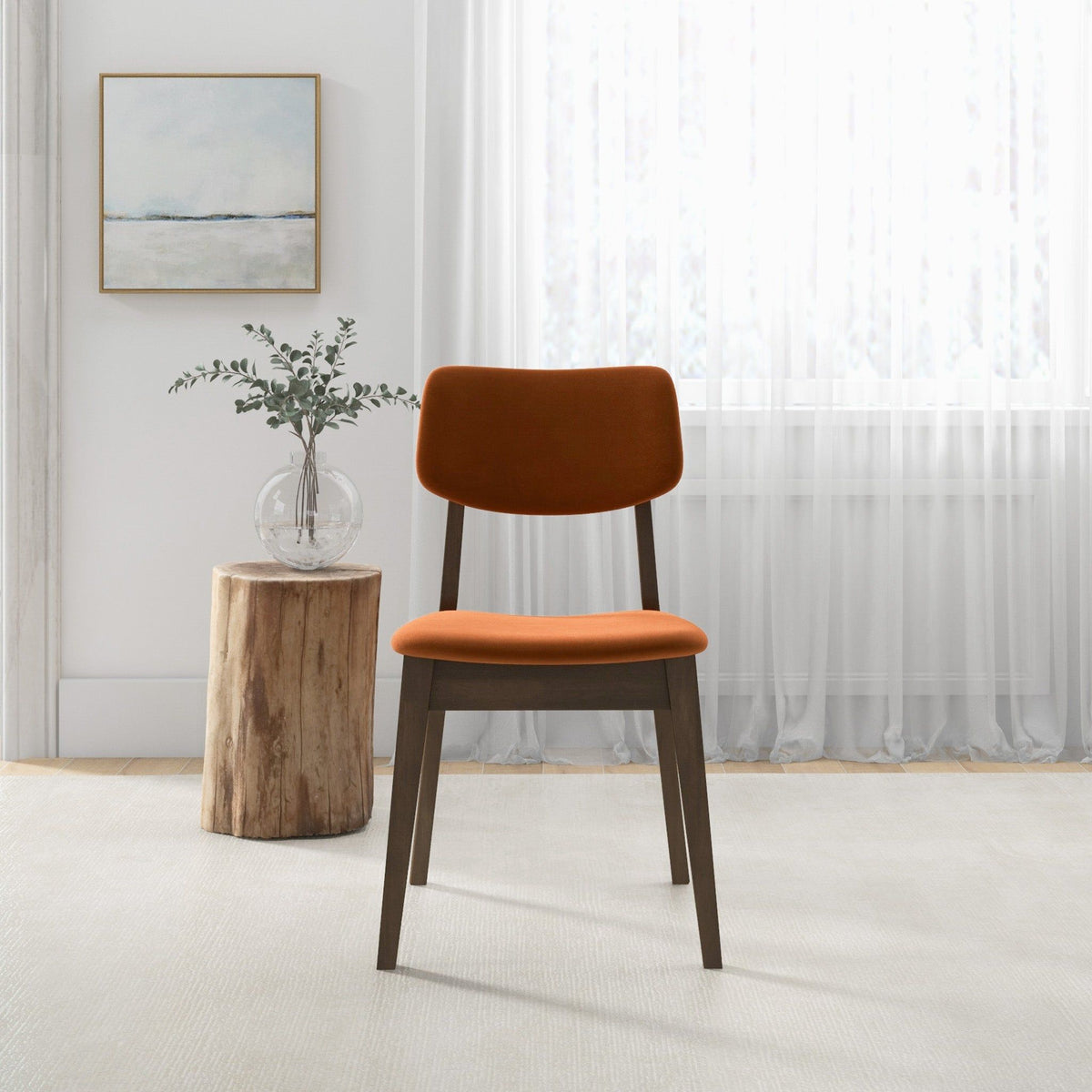 Solid Back Side Chair set in orange upholstery with dark wood legs in mid-century modern space on Tampa Home & Garden Store