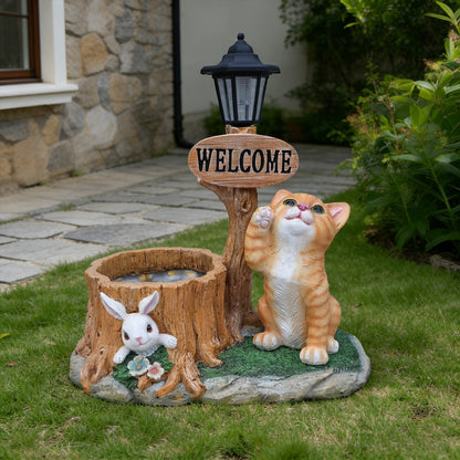 Cat Planter Statue with welcome sign and lantern; orange tabby cat beside bunny on Tampa Home & Garden Store