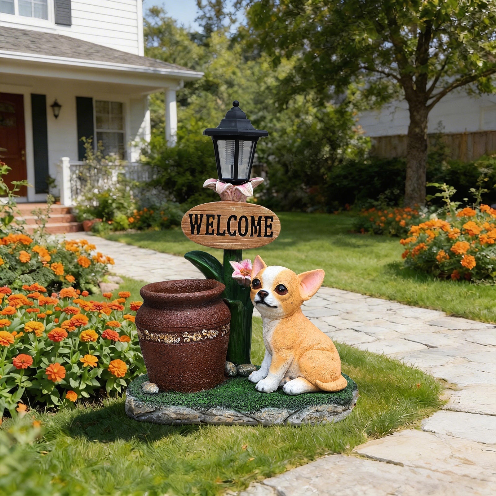 Sitting Corgi Dog Planter statue with black lantern and WELCOME sign in garden on Tampa Home & Garden Store