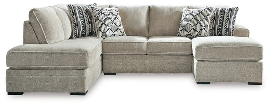 Calnita stationary L-shaped sectional sofa, beige boucle fabric with patterned cushions on Tampa Home & Garden Store