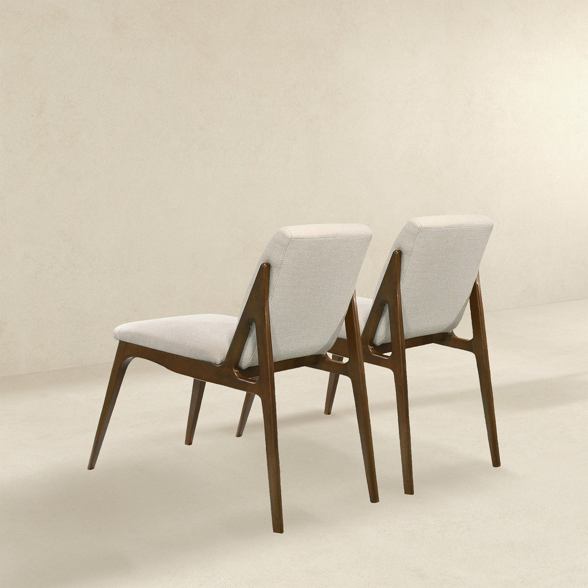 Elegant dining chair set for kids with light beige upholstered fabric and wooden legs on Tampa Home & Garden Store