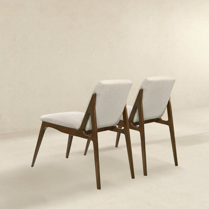 Elegant dining chair set for kids with light beige upholstered fabric and wooden legs on Tampa Home & Garden Store