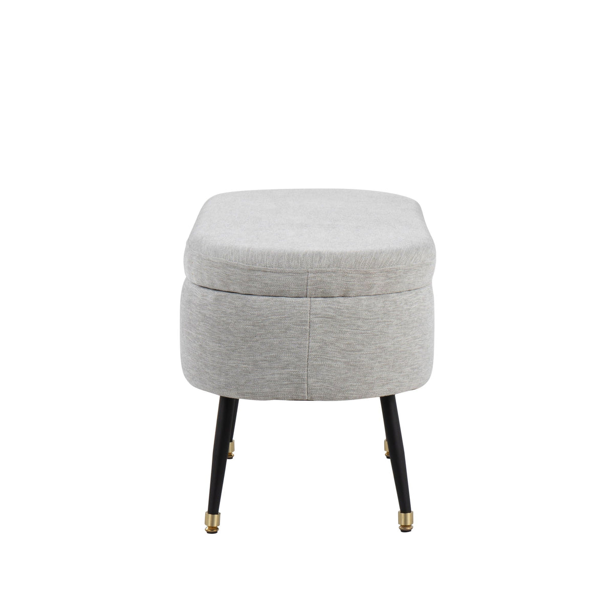 Contemporary storage bench with light gray fabric upholstery and black legs on Tampa Home & Garden Store