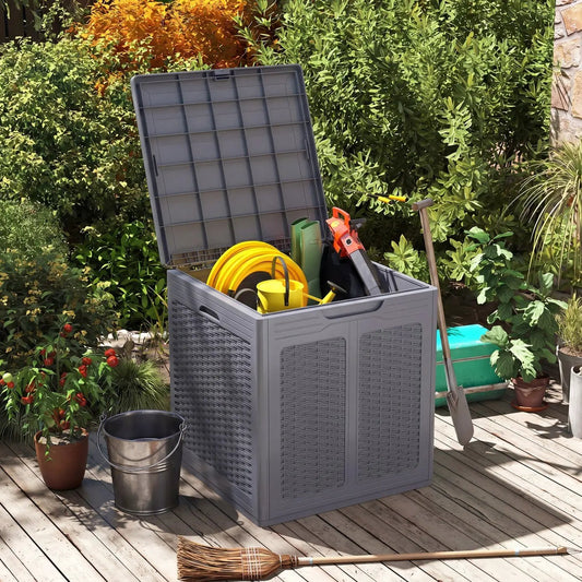 Deck box 39 gal with lockable gray lid, weatherproof storage, open with yellow hose reel on Tampa Home & Garden Store