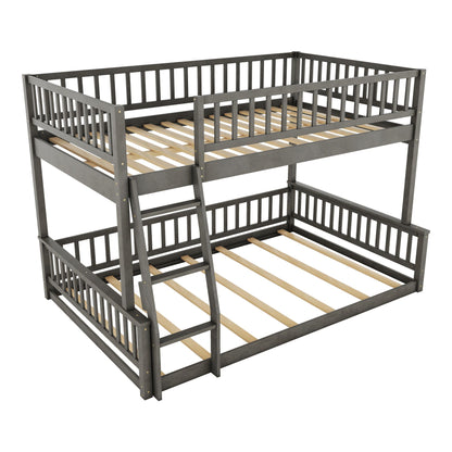 Gray metal bunk bed with ladder and guardrails, two-tier with wooden slat bases on Tampa Home & Garden Store