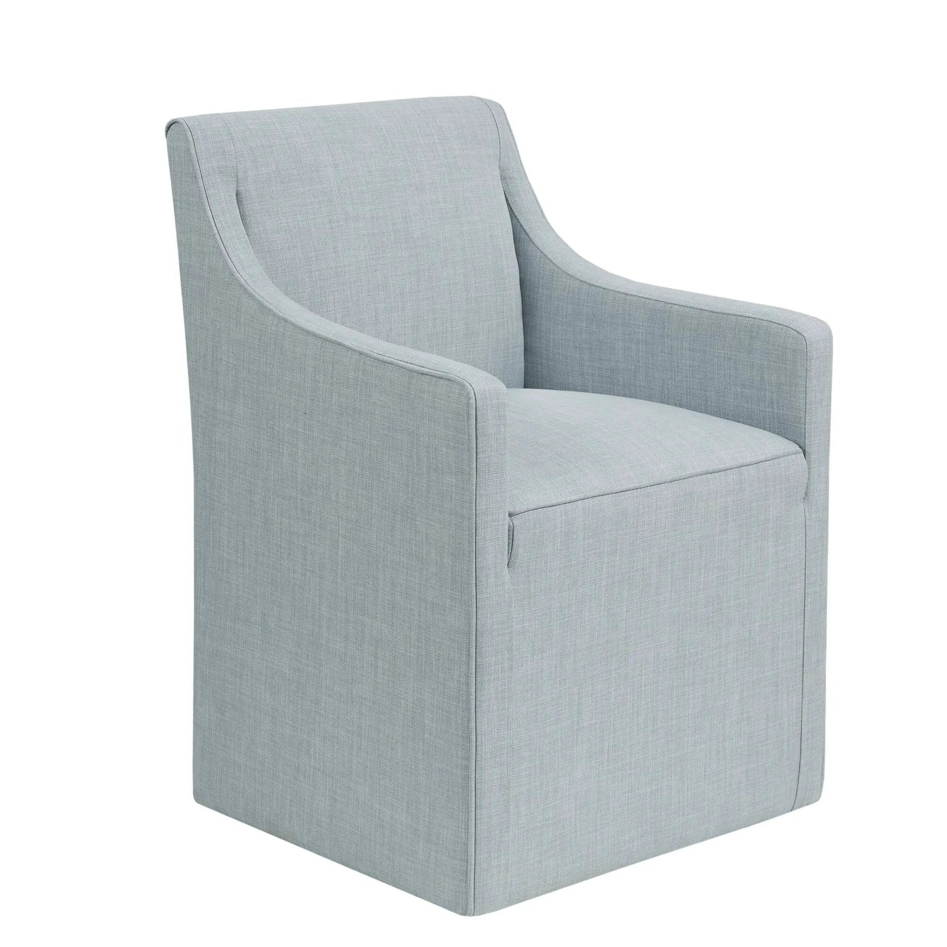 Traditional skirted dining arm chair in light blue-gray fabric with upholstered arms on Tampa Home & Garden Store