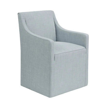 Traditional skirted dining arm chair in light blue-gray fabric with upholstered arms on Tampa Home & Garden Store