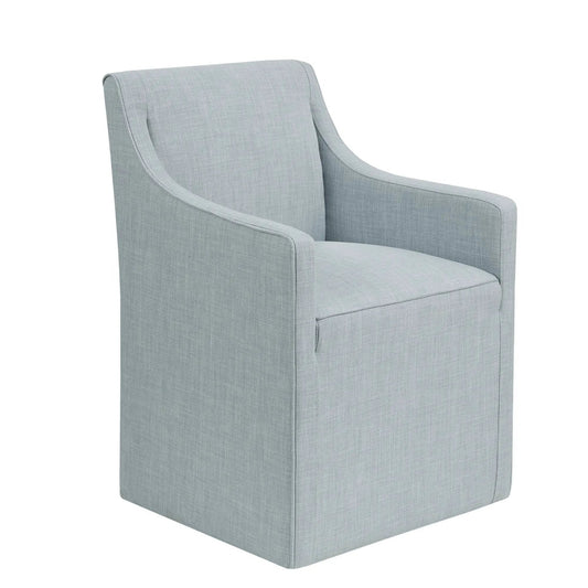Traditional skirted dining arm chair in light blue-gray fabric with upholstered arms on Tampa Home & Garden Store