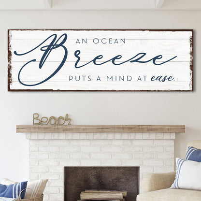 Tailored Canvases canvas sign reading An Ocean Breeze Puts A Mind At Ease in navy script on Tampa Home & Garden Store