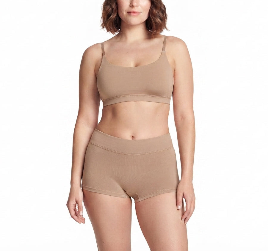 Net Positive organic cotton boyshorts in beige with high-rise waistband on model on Tampa Home & Garden Store