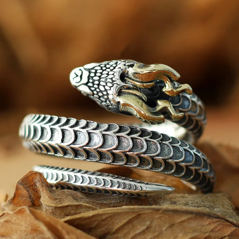 Draco Coil Ring by BikerZoneZ, silver-tone dragon-scale coil band with gold-accent dragon head on Tampa Home & Garden Store