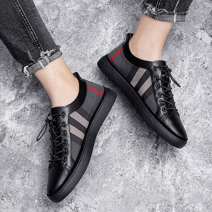 Stevvex men's black canvas sneakers with gray stripes and red heel accent, lace-up vulcanized on Tampa Home & Garden Store