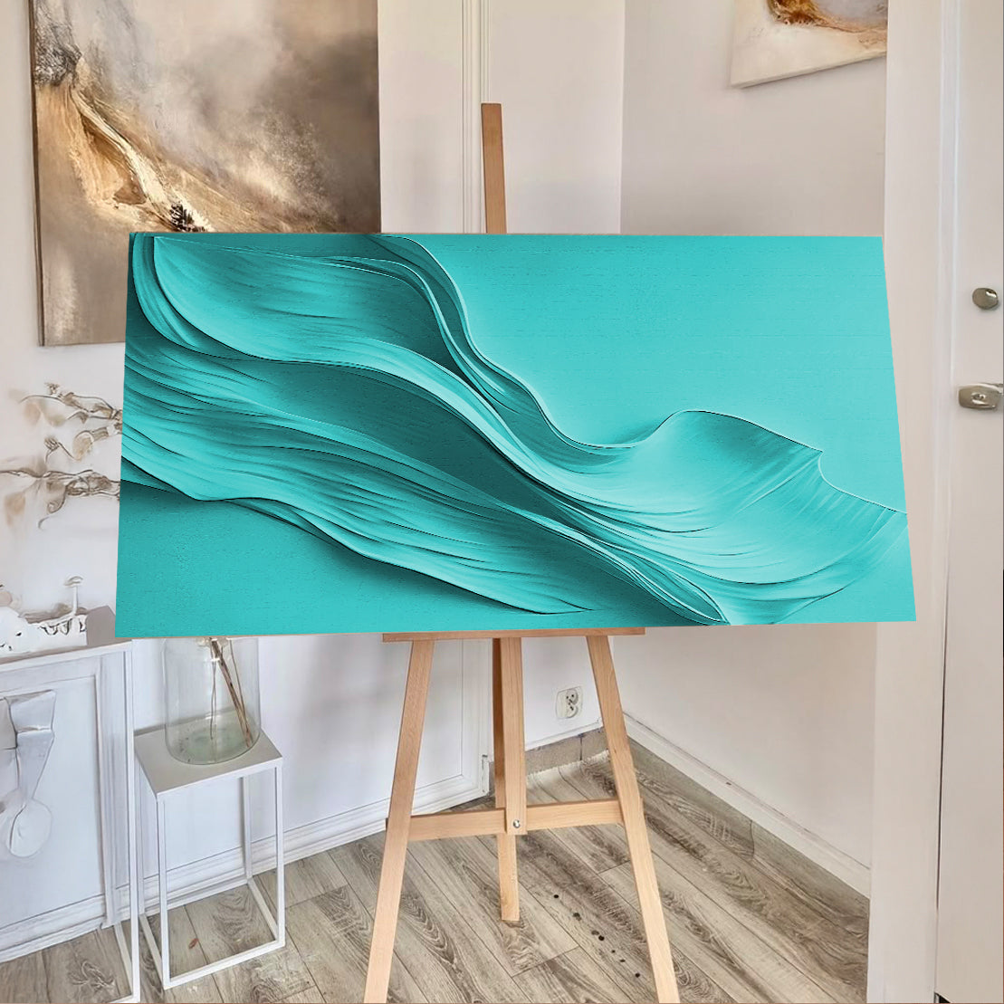 Turquoise minimalist wall art canvas by Tailored Canvases on an easel in a bright room on Tampa Home & Garden Store