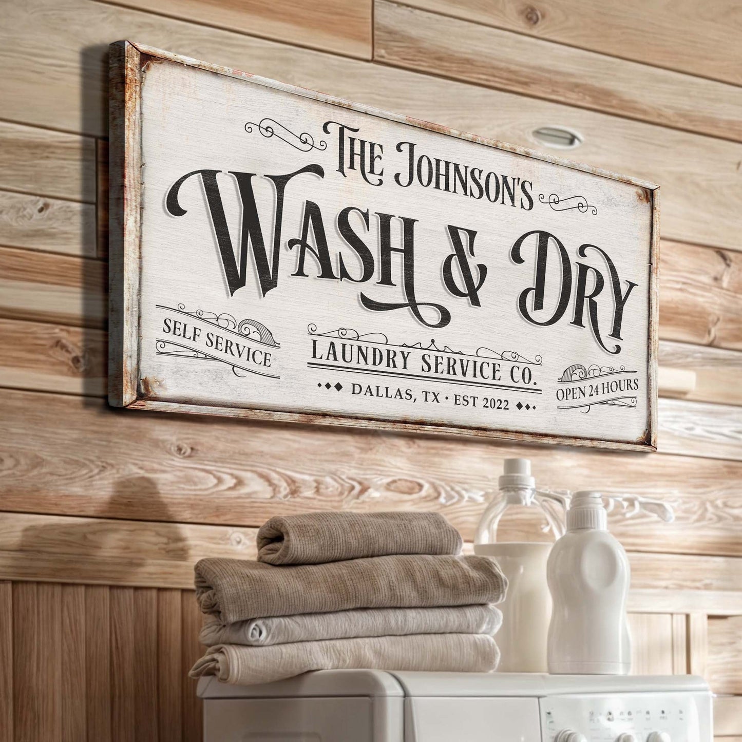 Personalized laundry service canvas sign with distressed white panel on Tampa Home & Garden Store
