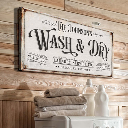 Personalized laundry service canvas sign with distressed white panel on Tampa Home & Garden Store