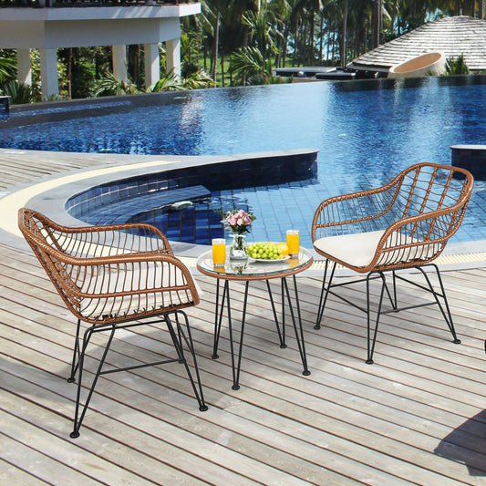 DirectDeals 3-Piece Rattan Bistro Set with Cushions and Glass Table on pool deck on Tampa Home & Garden Store