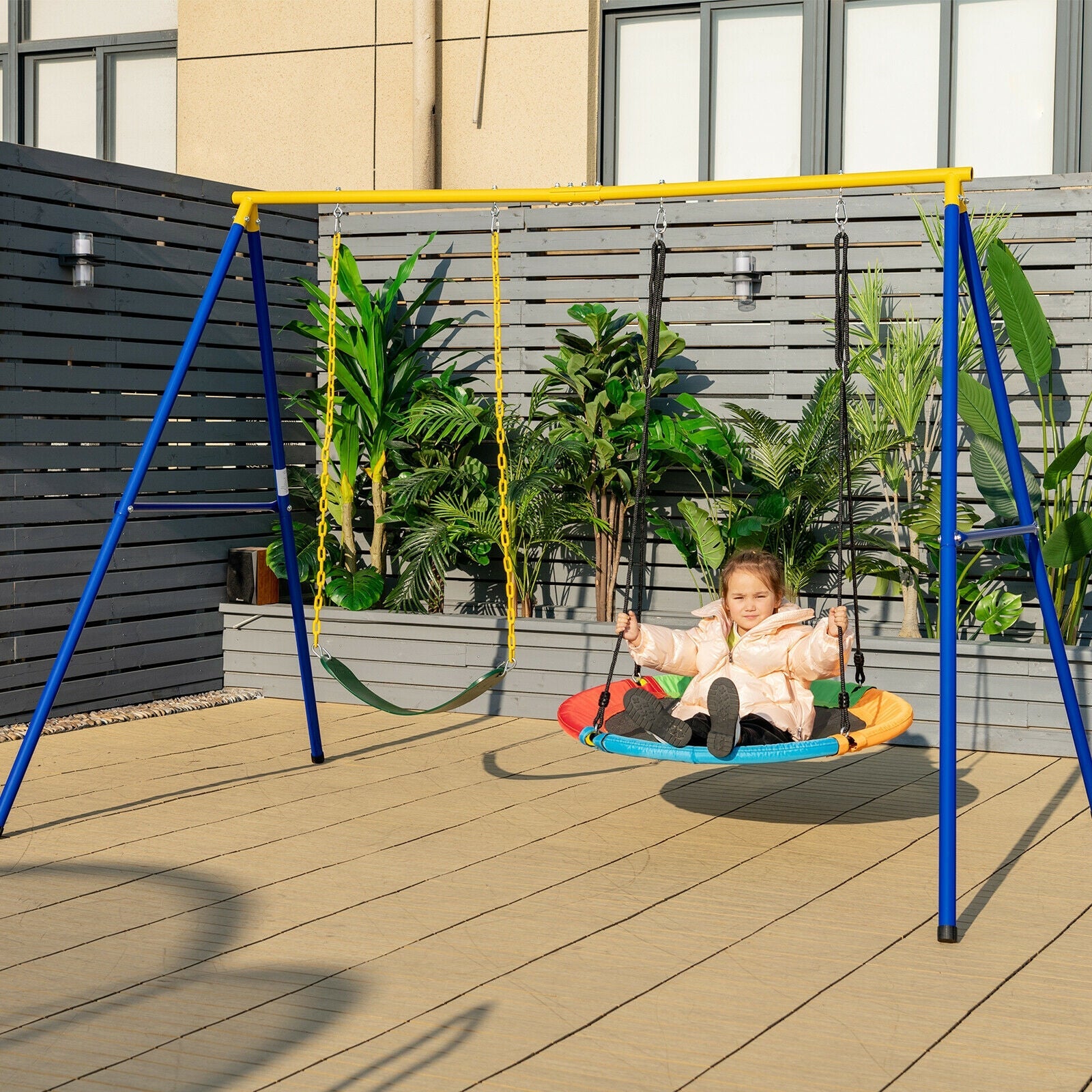 2-pack swing seats and saucer swing on blue and yellow frame with child on saucer swing on Tampa Home & Garden Store