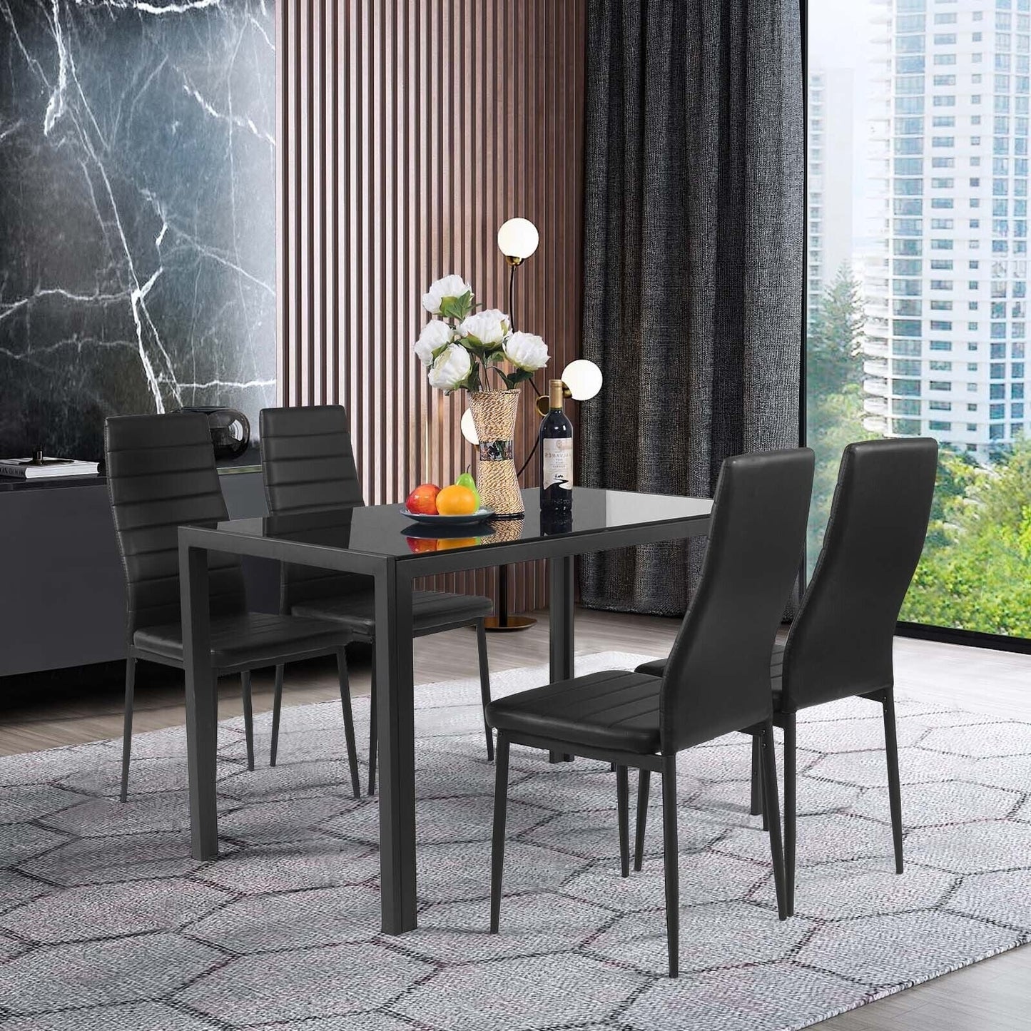 4-piece modern leather dining chairs set with metal frames in black around glass dining table on Tampa Home & Garden Store