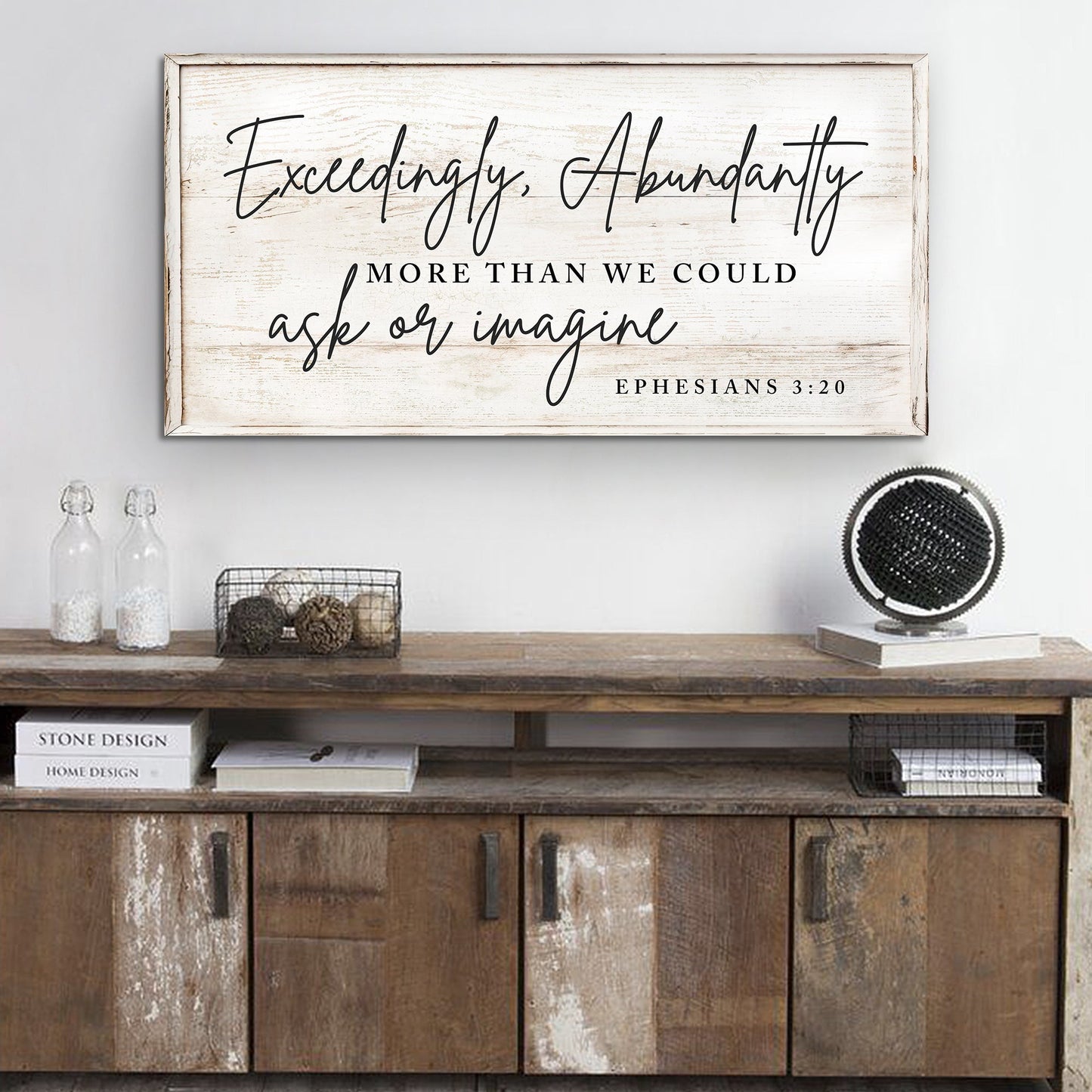 Canvas sign Exceedingly Abundantly More Than We Could Ask Or Imagine on whitewashed backdrop on Tampa Home & Garden Store