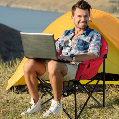 Folding camping moon padded chair by GemGear red seat with black frame outdoors by tent on Tampa Home & Garden Store
