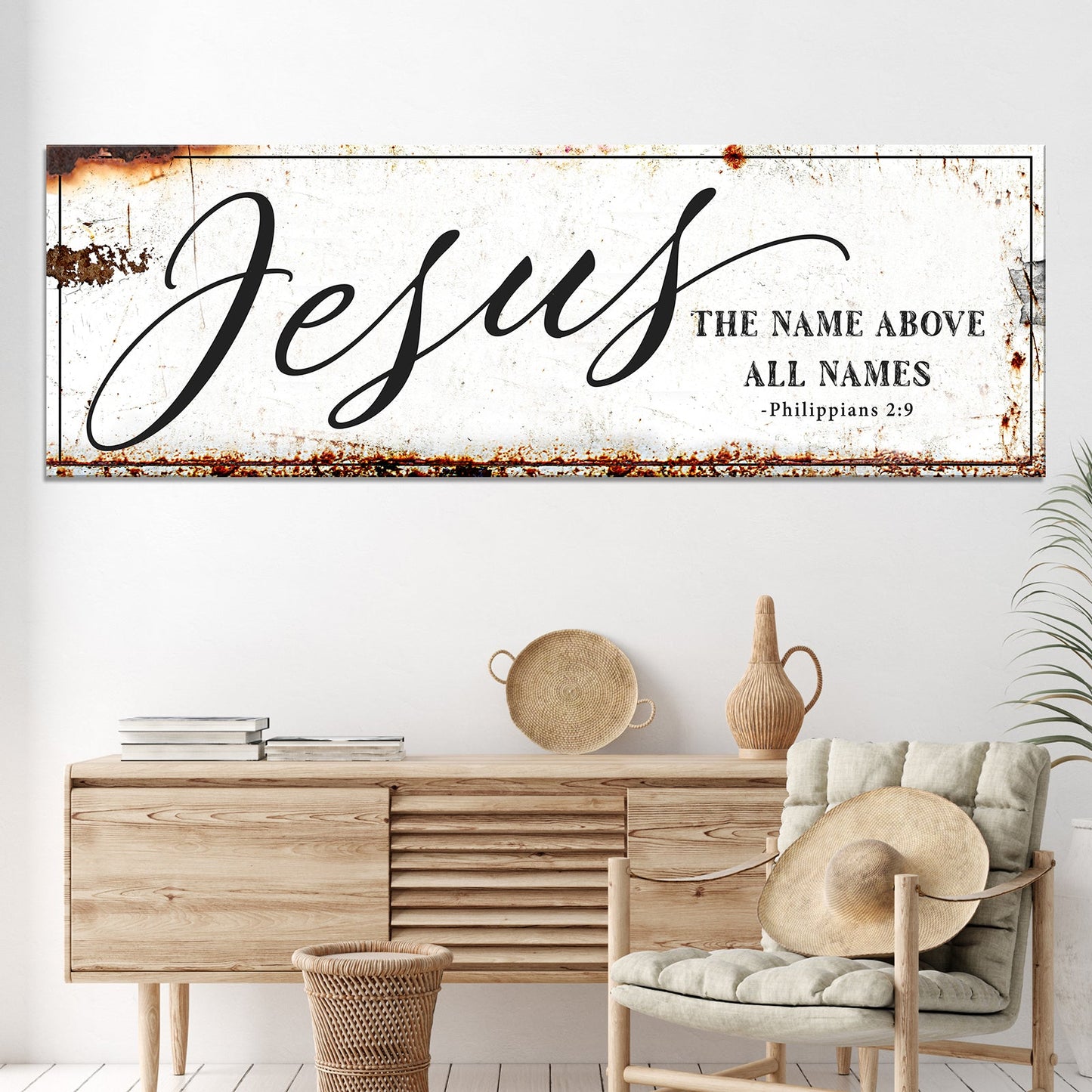 Jesus canvas wall sign with large script and Philippians 2:9 verse, rustic weathered edges on Tampa Home & Garden Store