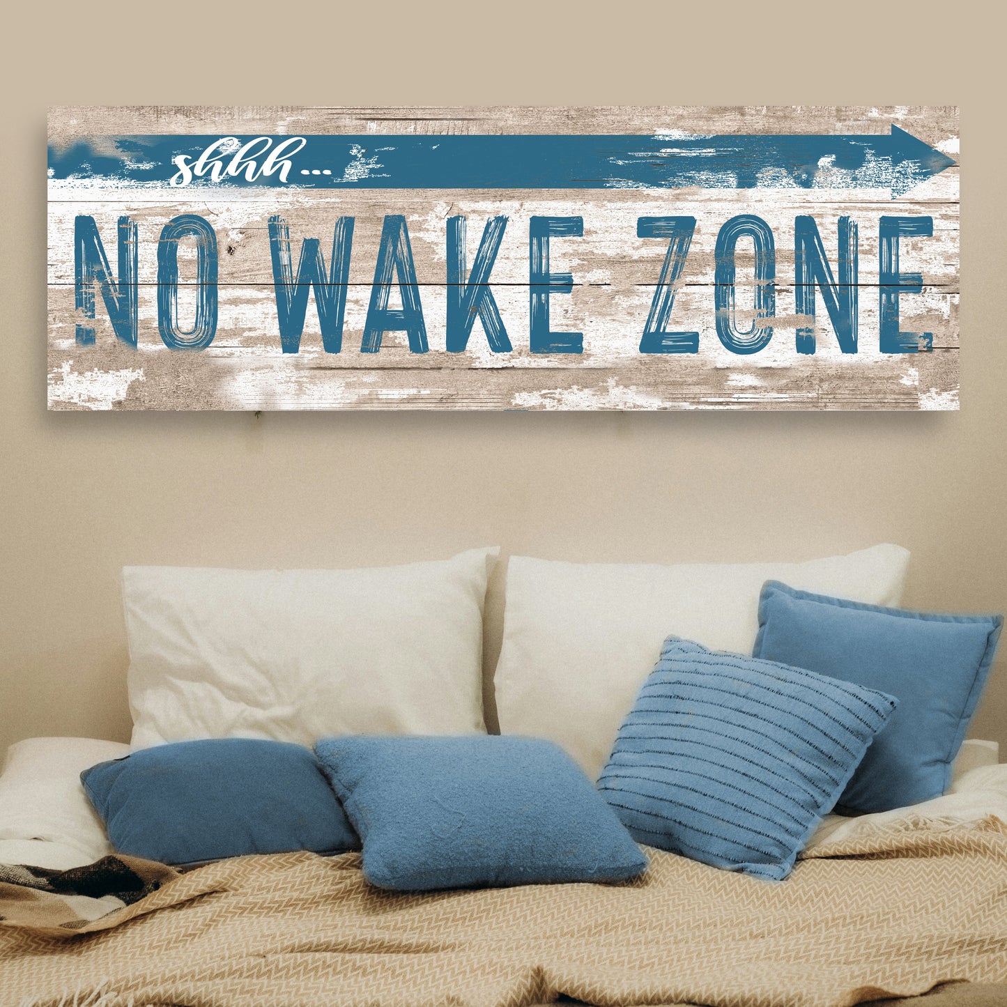No Wake Zone Canvas sign on distressed wood with bold blue letters and arrow Tailored Canvases on Tampa Home & Garden Store