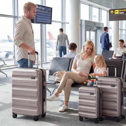 GemGear 3-Piece hardside luggage set metallic silver 20/24/28 inch suitcases at airport on Tampa Home & Garden Store